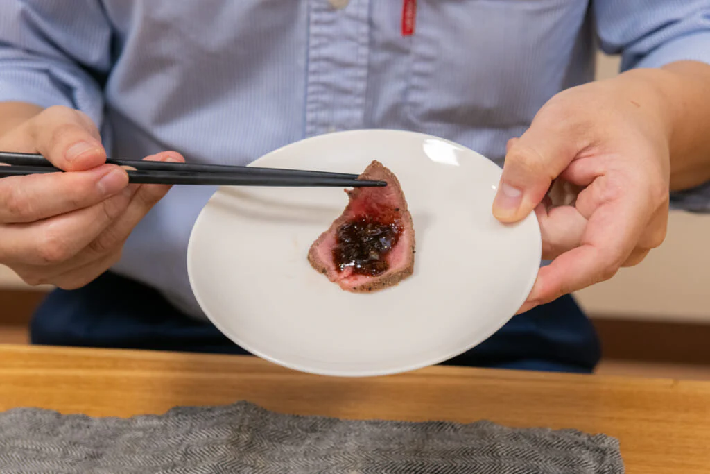 たれをくるっと巻くのが木場さん流!