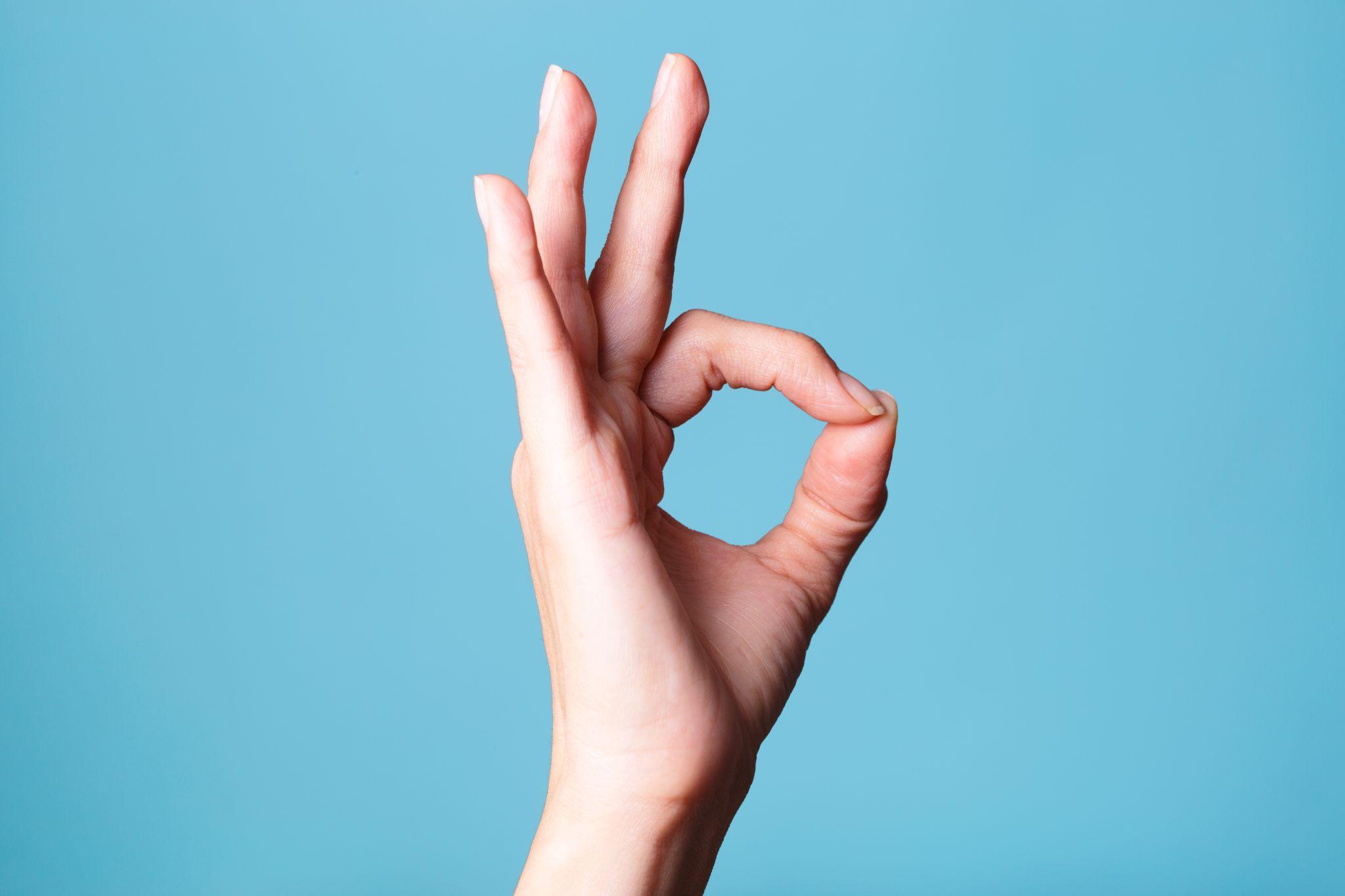 オッケーサインをした手
