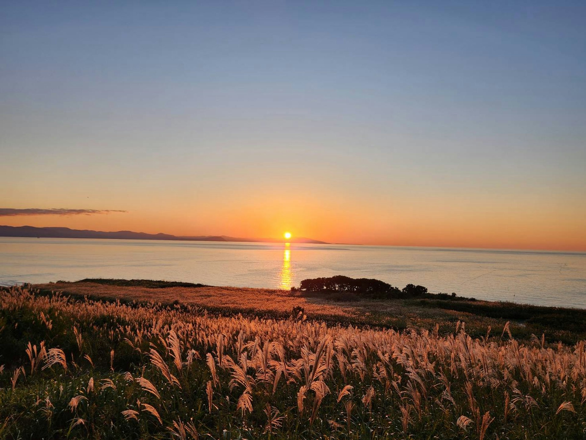 The sunset over the sea at Mochirai