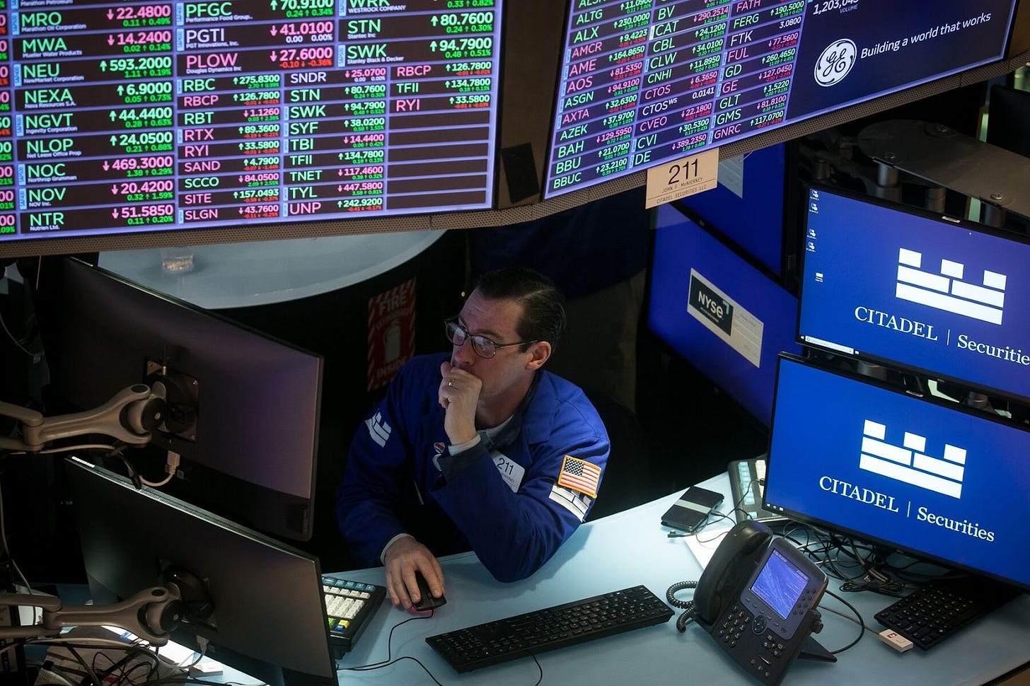 Wall Street traders digest latest US jobs report. Photographer: Michael Nagle/Bloomberg