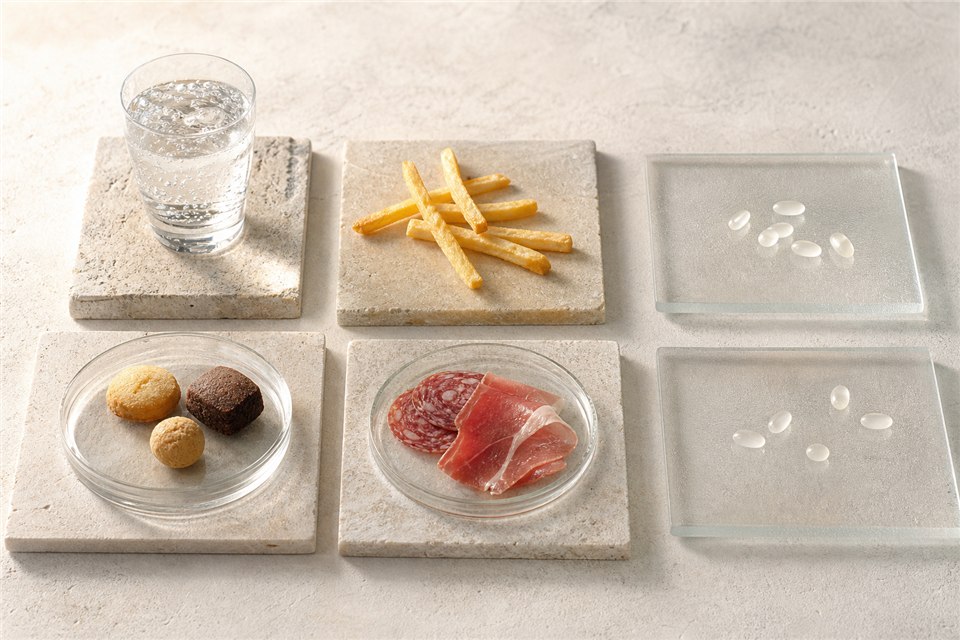 食品グループごとに異なる腸内細菌との関係をイメージした食卓