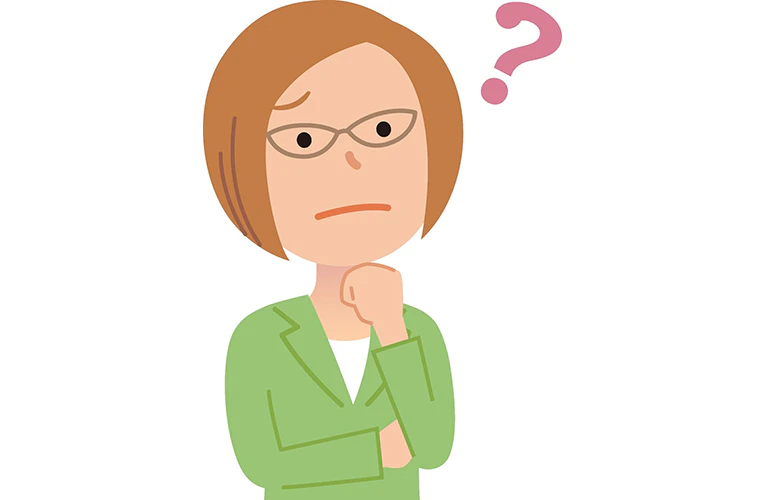 スーツを着た女性が悩んでいる