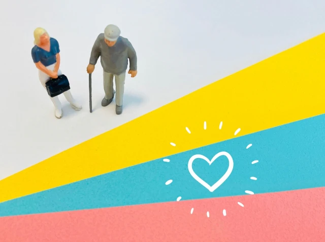 男女のミニチュア人形とハートマーク