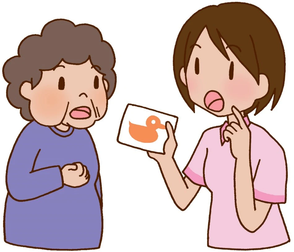 言語聴覚士がおばあちゃんにリハビリテーション行っているようす