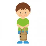 お墓参りの男の子