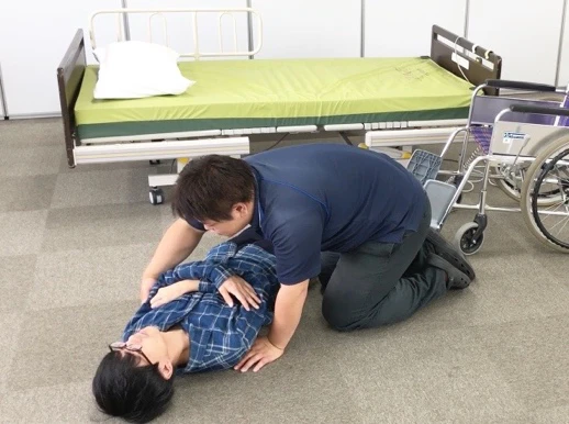 利用者さんの体を横にする