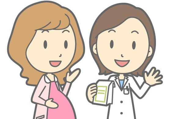 薬剤師さんと話している妊婦さん