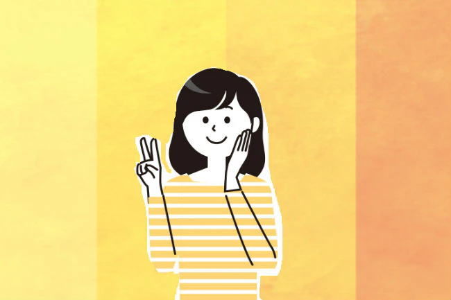 ピースする女性