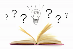 本と電球の周りにはてなマーク