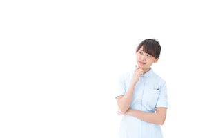考えるポーズの看護師さん