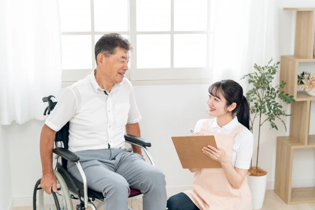 話を聞くスタッフと患者さん