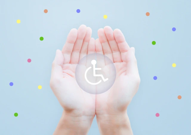 手の中に車椅子マーク