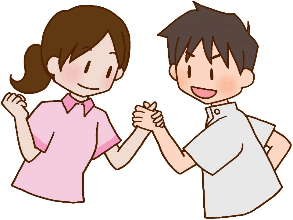言語聴覚士の男女が握手しているようす