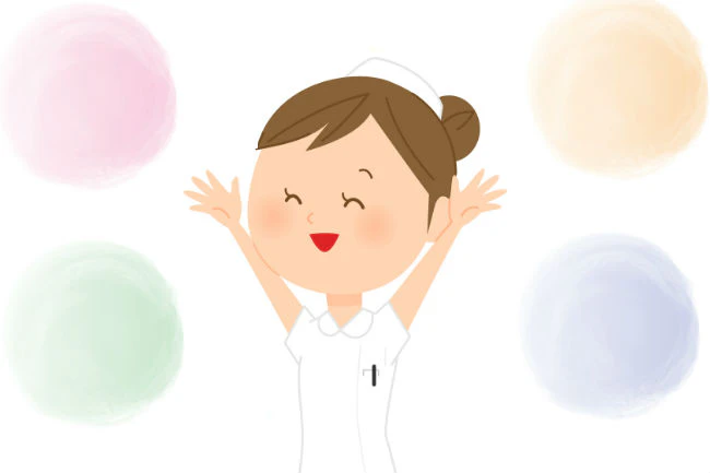 両手をあげて喜ぶ看護師