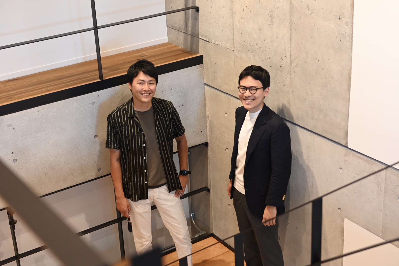 Stair area on the second and third floors of the new Whatever SHIMOGAMO-EAST facility, with generous openness and warm wood underfoot unlike other facilities.