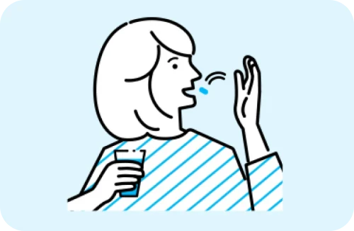 「GABA」のサプリメントを飲む女性