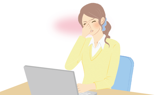 目頭を抑える女性