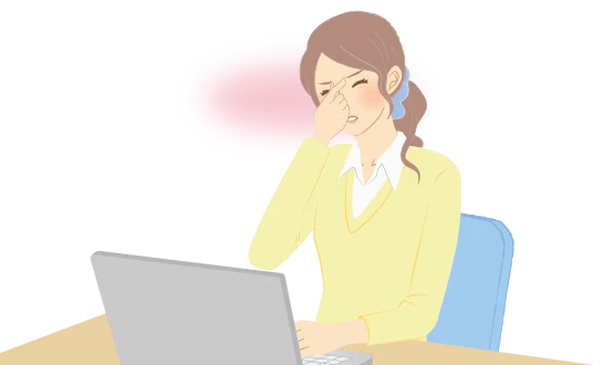 目頭を抑える女性