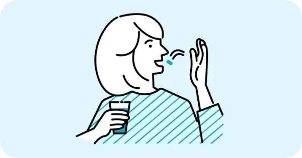 睡眠改善薬を服用する女性のイラスト