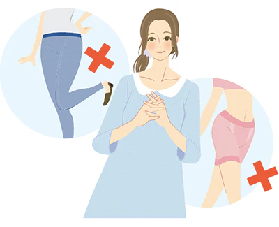 腹部が締めつけられない服装に着替える