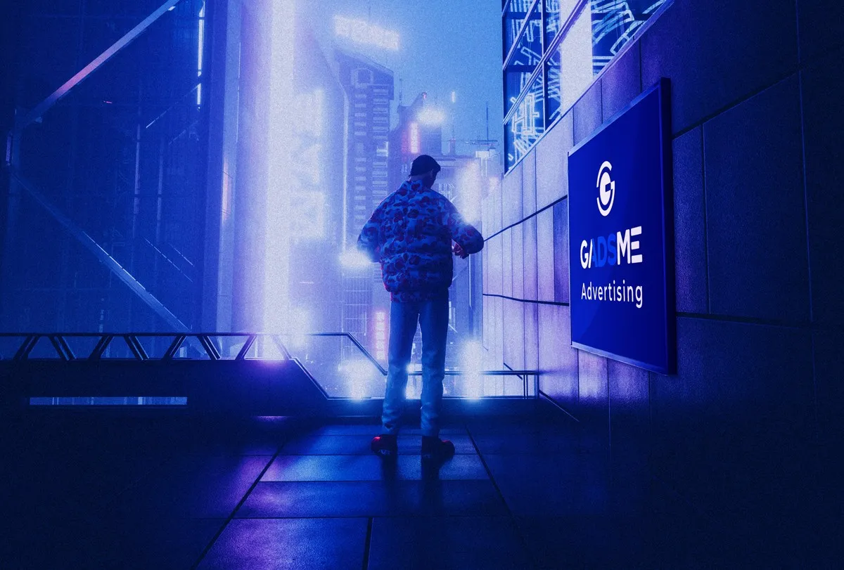 都市の屋外広告（ビルボード）とゲーム内広告の到達力を比較するイメージ
