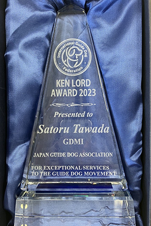The plaque reads, ‘For Exceptional Services to the Guide Dog Movement.’