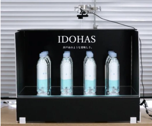 ラベルレスボトルを表現メディアにする液晶モニタを搭載したインタラクティブな陳列棚の提案と試作 の研究画像
