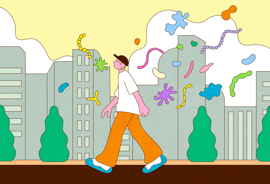 An illustration of a person walking through a city lined with tall buildings. Many microorganisms are depicted near the person.