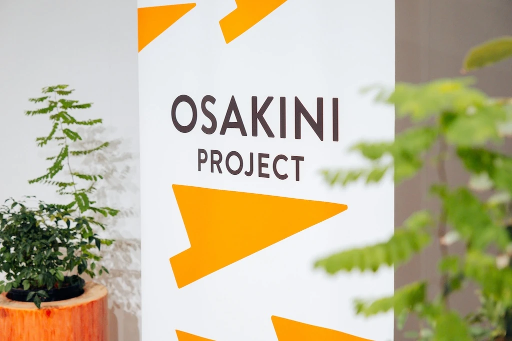 Photo of the “OSAKINI PROJECT” sign.