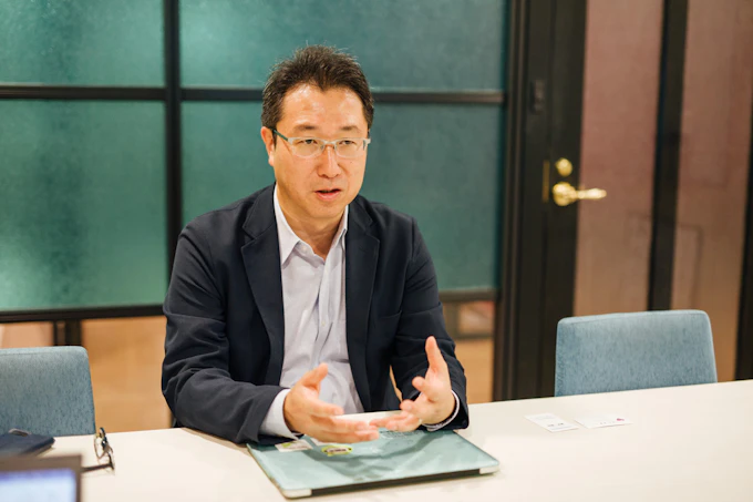 藤田利之さんへの取材の写真