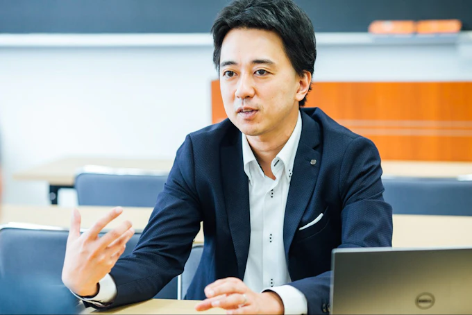 国見健介さんへの取材の写真