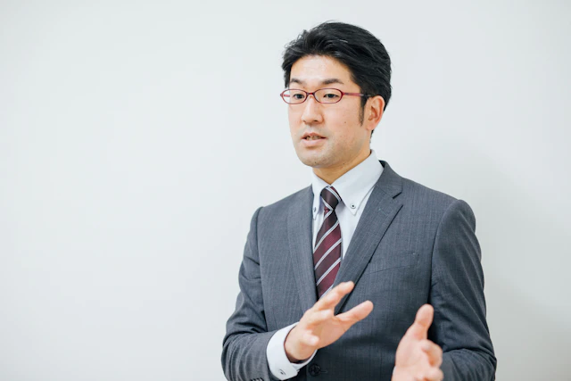 塚越 学