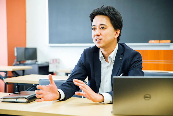 国見健介さんへの取材の写真