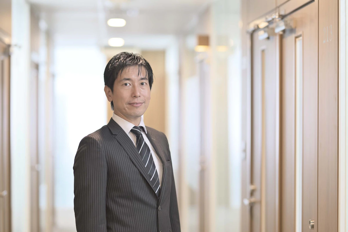 万野 裕人