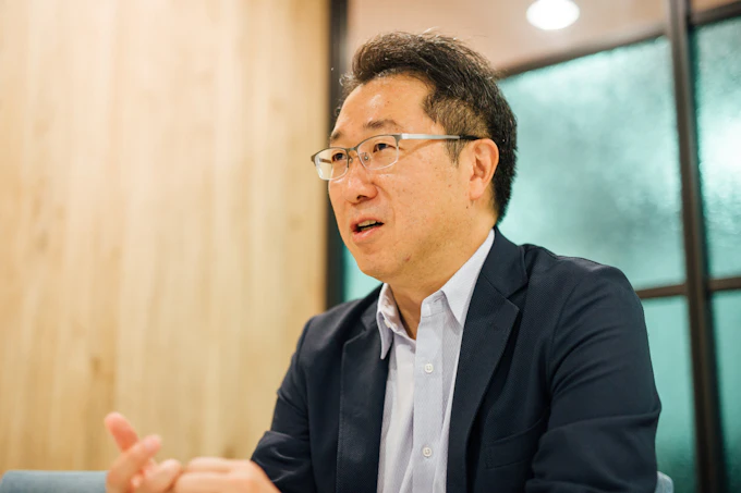 藤田利之さんへの取材の写真