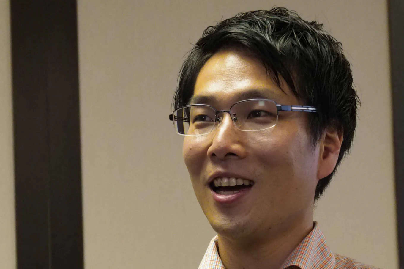 尾崎 智史さん