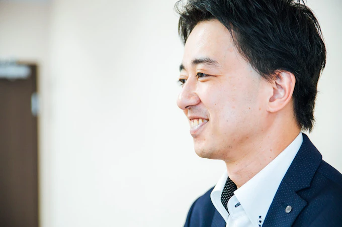 国見健介さんへの取材の写真