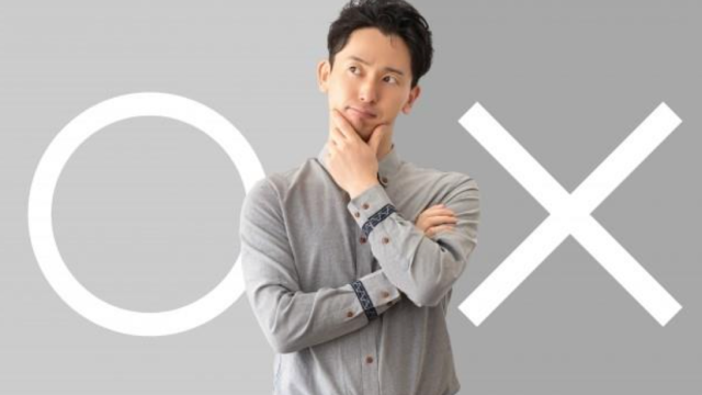 丸バツと考える男性