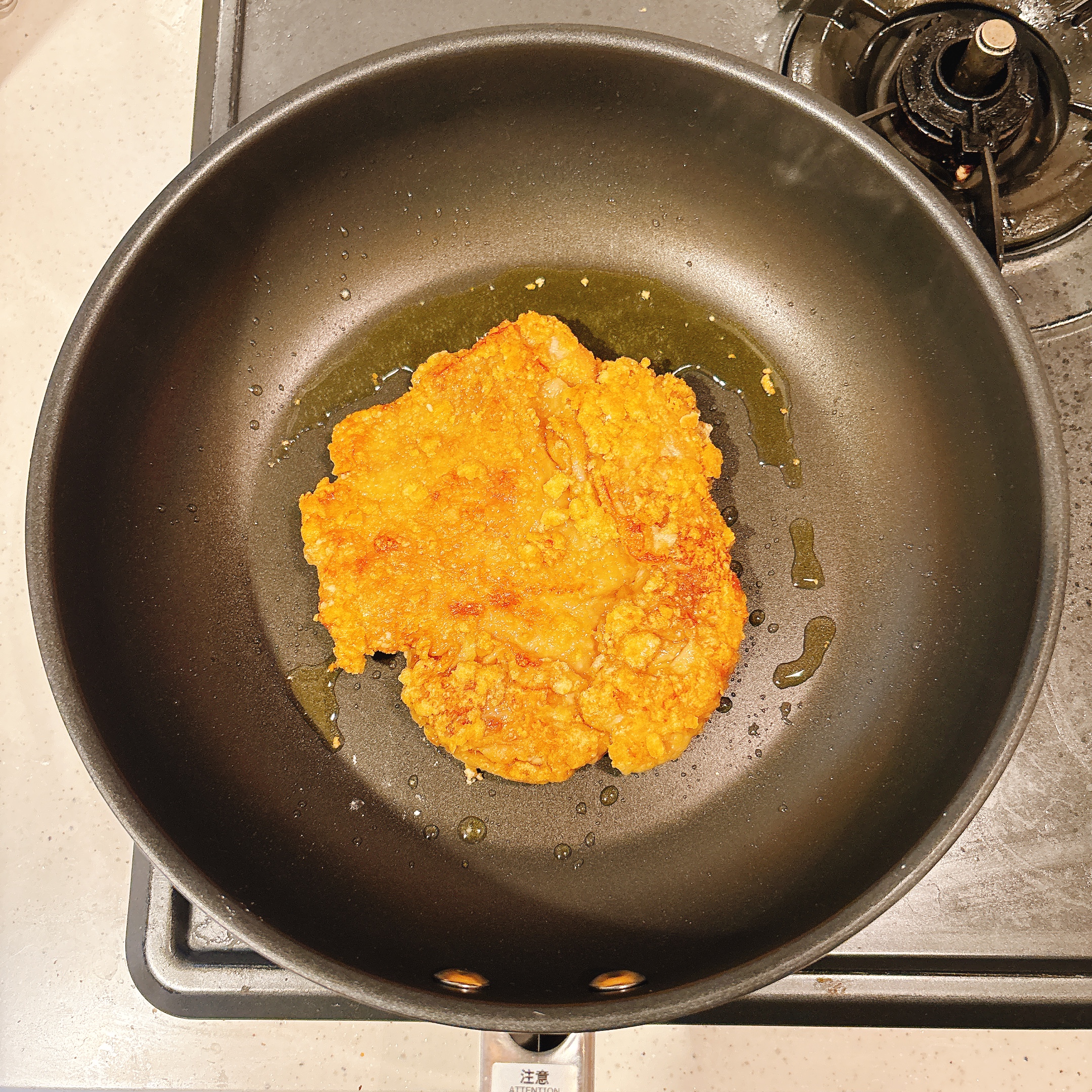 調理（鶏もも肉を焼く）