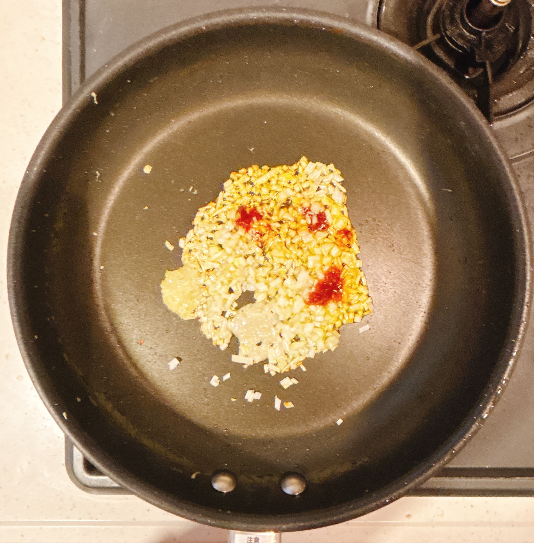 調理（調味料を炒める）