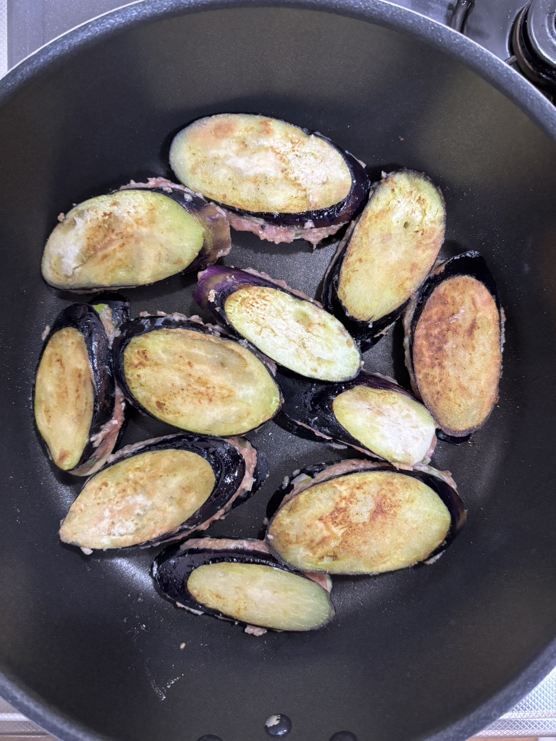 調理（ナスを焼く）