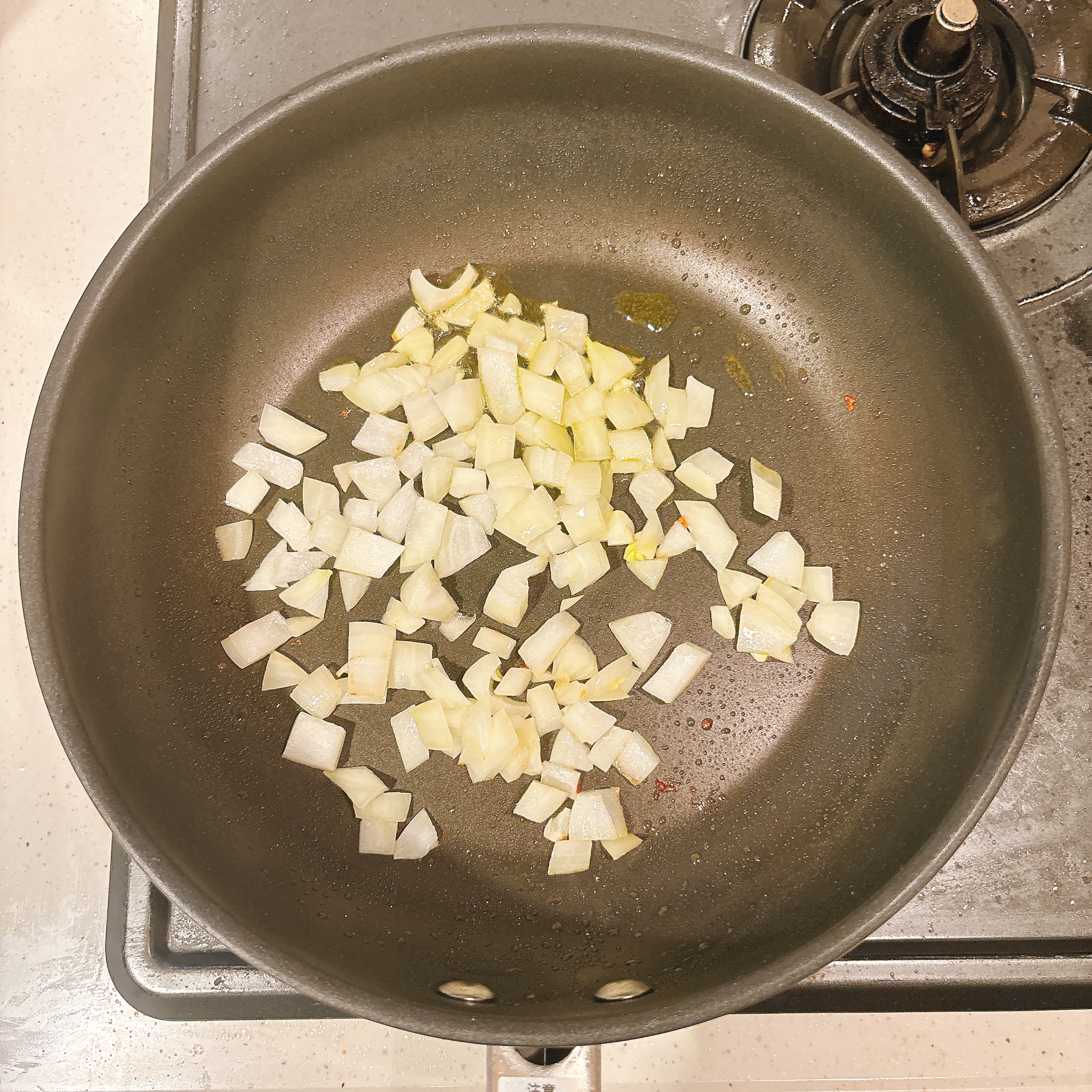 調理（玉ねぎを炒める）