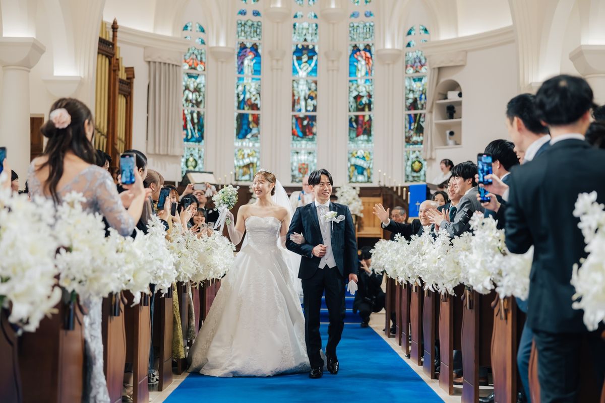 イメージカラーのオレンジで彩ったふたりらしい結婚式