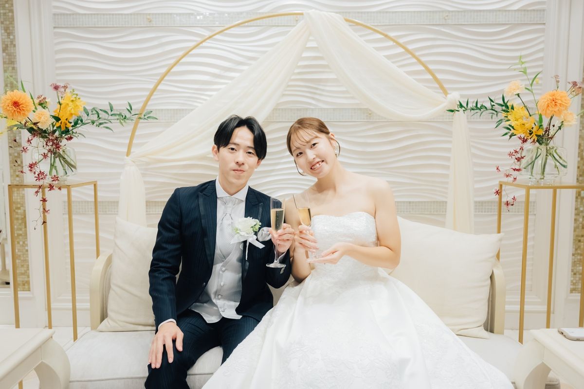 イメージカラーのオレンジで彩ったふたりらしい結婚式