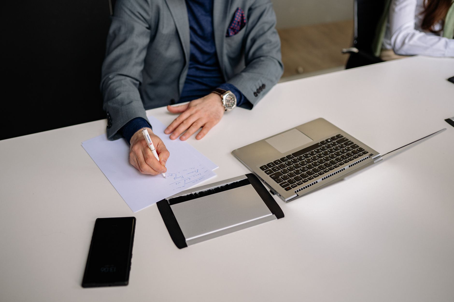 european business person writing