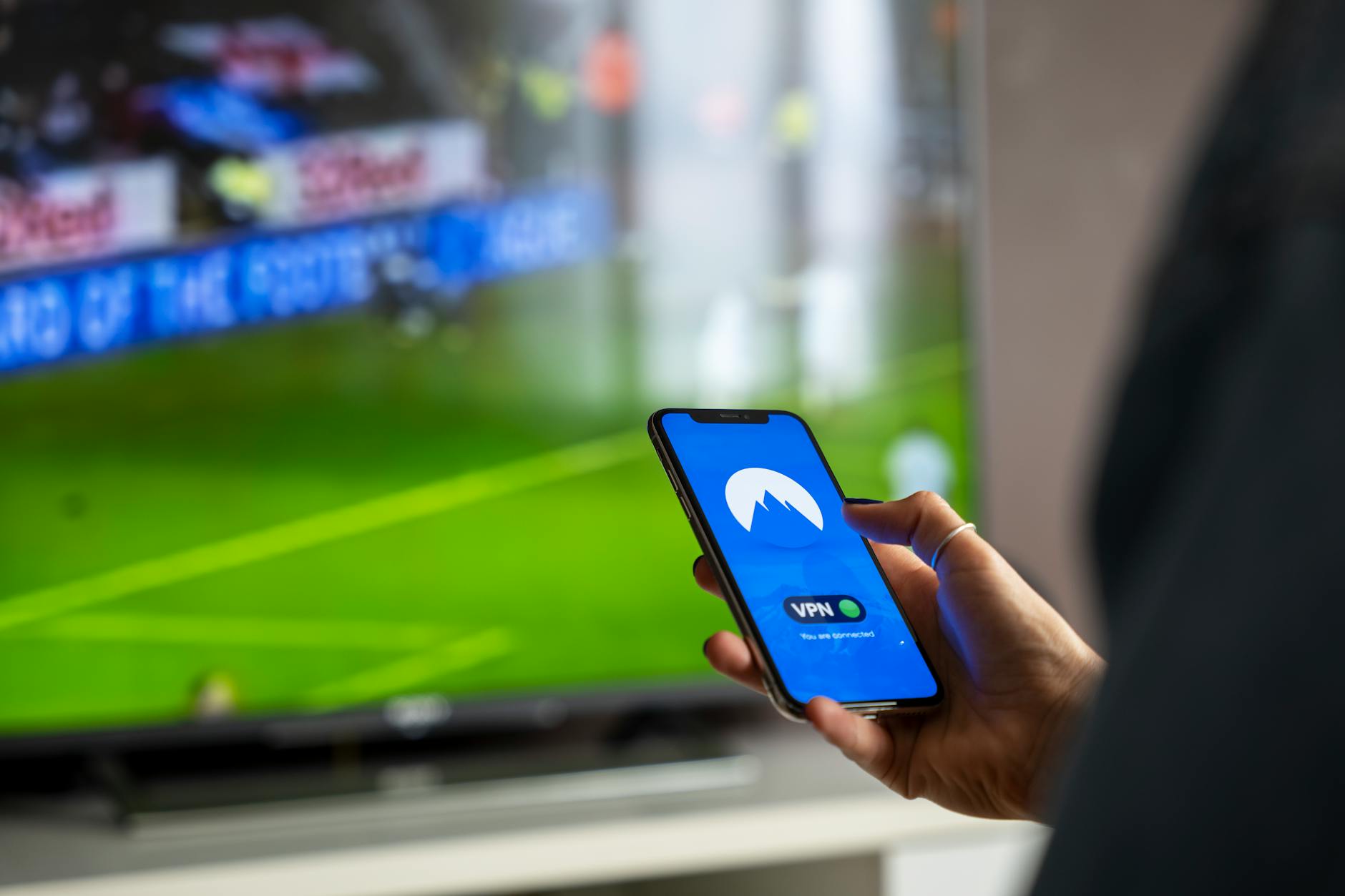 smartphone watching sports streaming