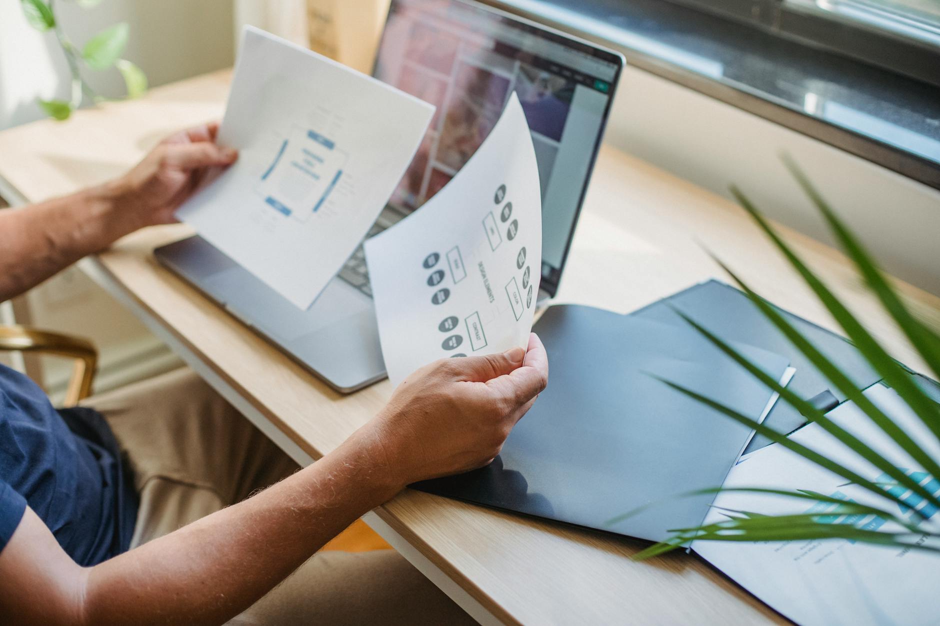 designer comparing software plans