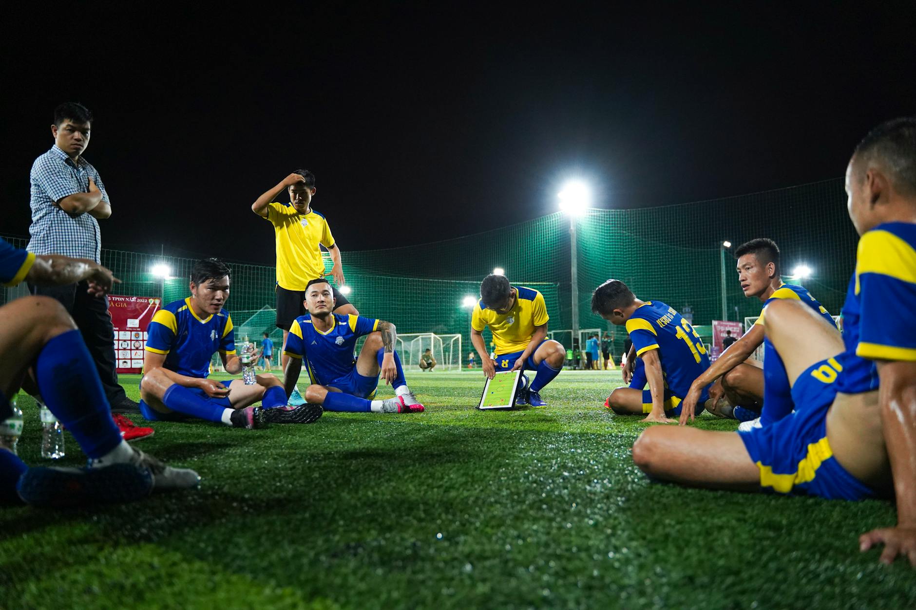 young student watching soccer