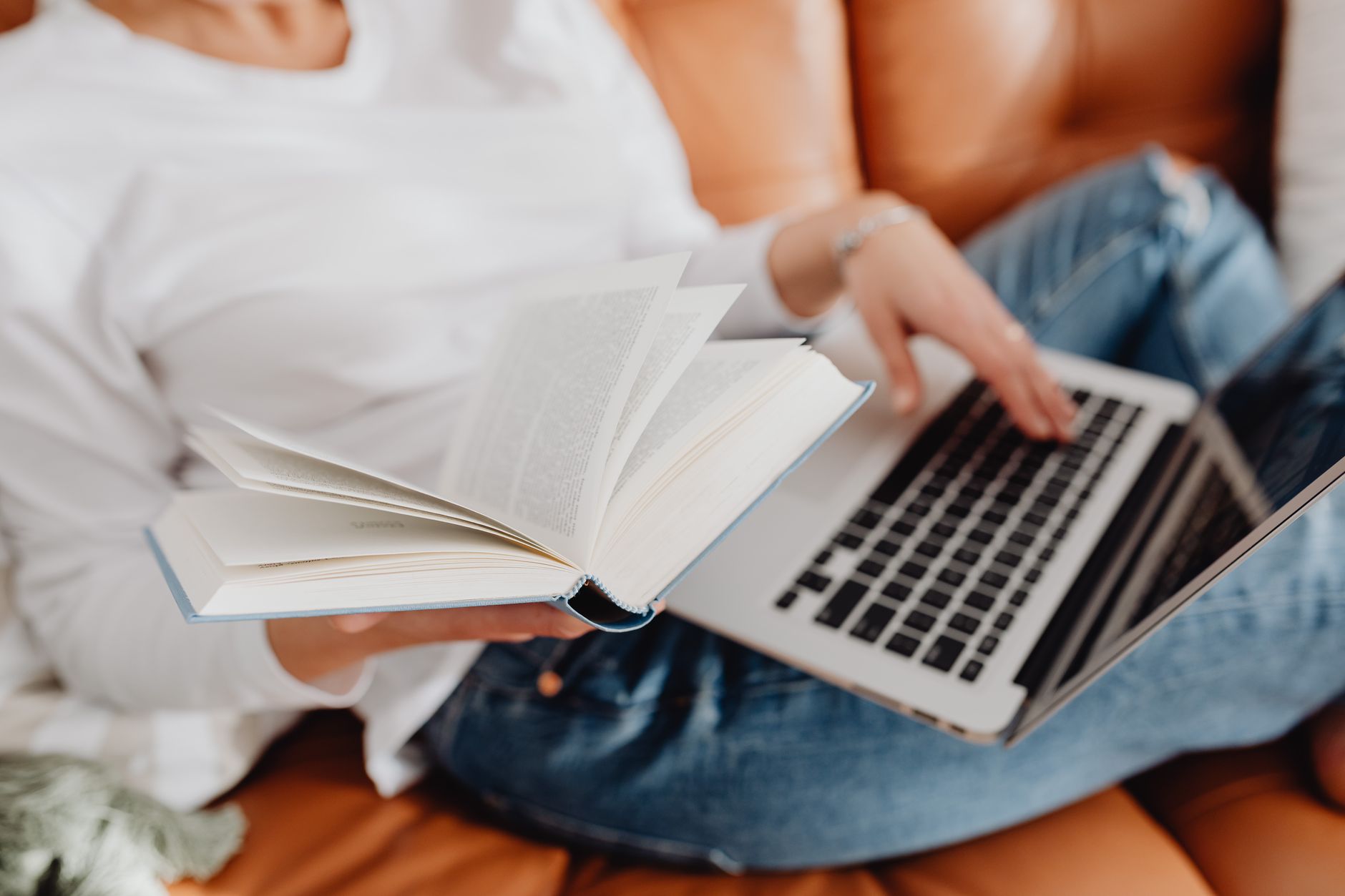 student reading book online