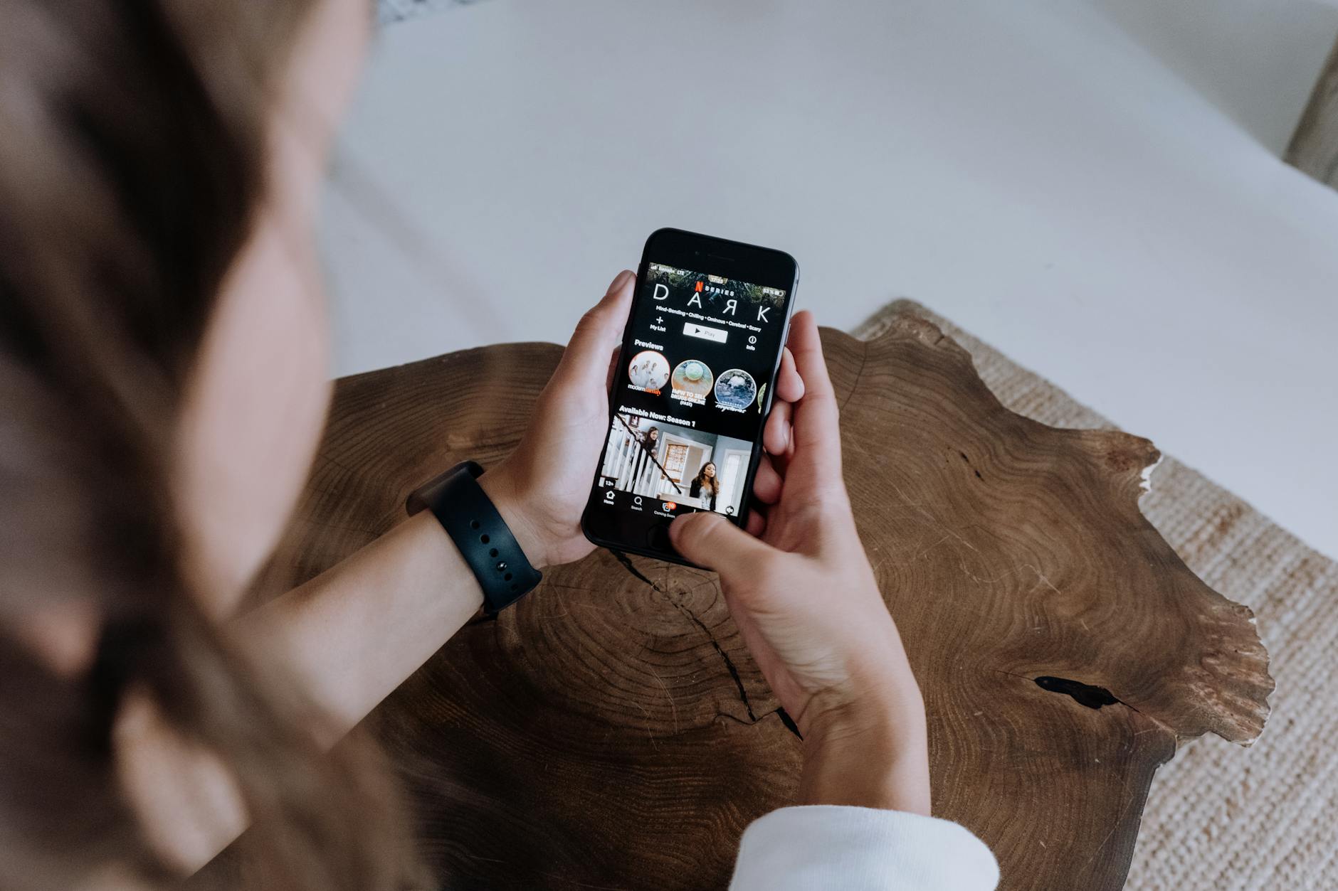 woman watching netflix on